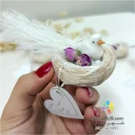 گیفت عروسی لانه پرنده حصیری با دیزاین گل محمدی